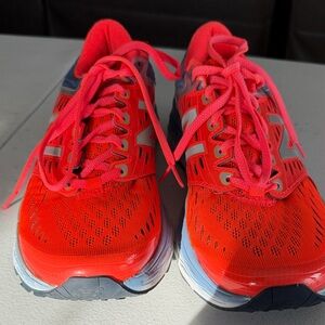 New Balance bright orange women’s shoe